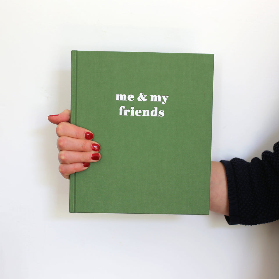 friendship book for grown-ups focusing on the positive and what you love about your loved ones. green cotton cover with silver hot foil embossing. 