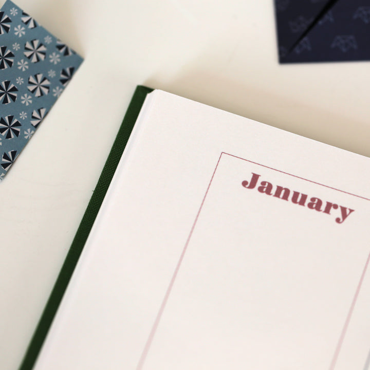 Open friendship book showing the birthday calendar, focused on the month of January.