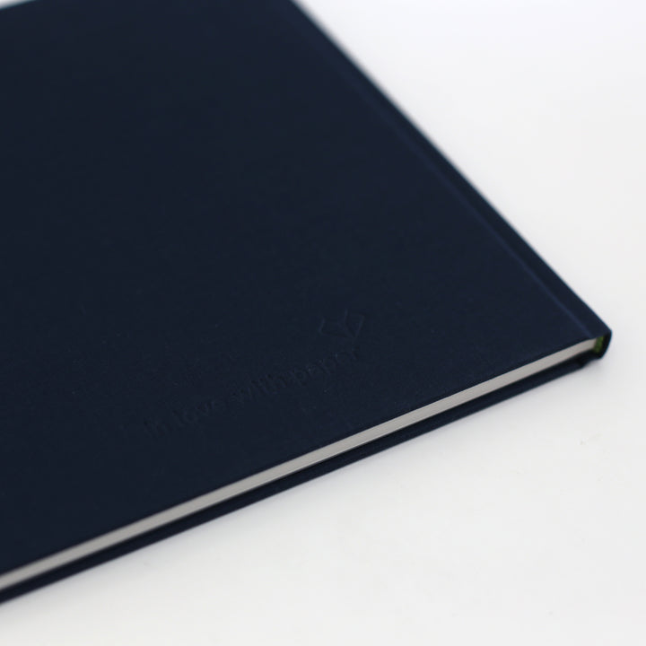 Book of Friendship featuring the embossed "in love with paper" logo